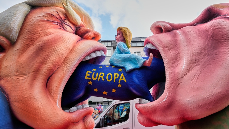 A carnival float depicting Russian President Vladimir Putin, right, and US President Donald Trump is pictured during the Rosemonday Carnival Parade in Duesseldorf, Germany, Monday, Feb. 16, 2026 (AP Photo/Martin Meissner)