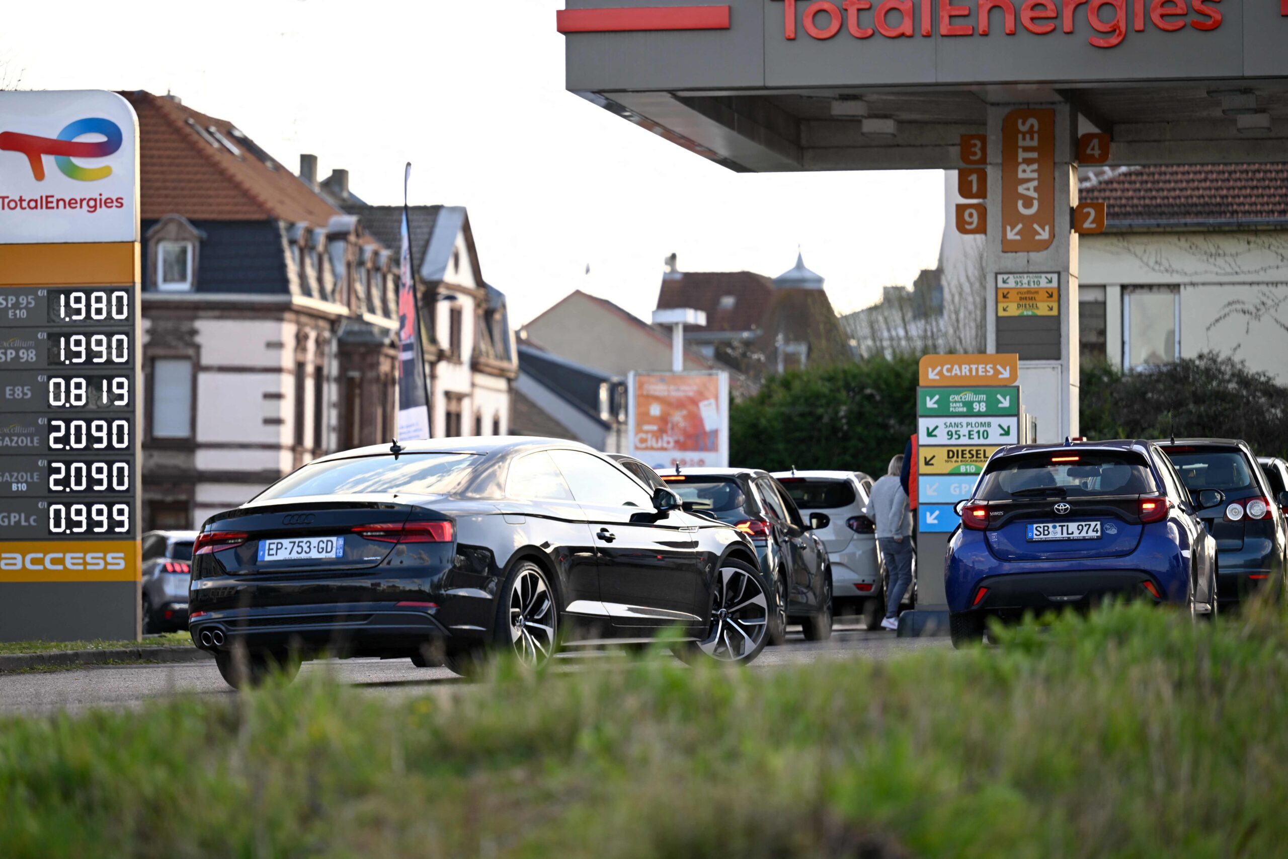 The daily prices for E10, SP98, Super Ethanol and diesel are displayed at a Total Access station in Forbach, northeastern France, on March 27, 2026. Many Germans living near the border come to France to fill up their tanks as prices are higher in ...