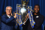 LEICESTER, ENGLAND - MAY 16: (L-R) Claudio Ranieri Manager of Leicester City and captain Wes Morgan of Leicester City show the trophy to the fans during the Leicester City Barclays Premier League winners bus parade on May 16, 2016 in Leicester, England. (Photo by Laurence Griffiths/Getty Images)