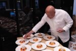 French chef Thierry Marx works on preparing dishes ahead of the Grand Dinner for Dogs at the Carnavalet Museum in Paris on September 28, 2026. (Photo by Xavier GALIANA / AFP)