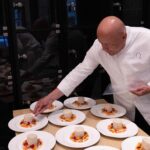 French chef Thierry Marx works on preparing dishes ahead of the Grand Dinner for Dogs at the Carnavalet Museum in Paris on September 28, 2026. (Photo by Xavier GALIANA / AFP)